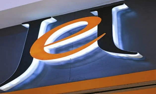 An illuminated logo hangs above the entrance to a Jet clothing store, operated by Edcon Holdings Ltd., in Johannesburg, South Africa, on Monday, Feb. 4, 2019. Edcon Holdings is making progress toward securing 3 billion rand ($226 million) in funding to keep the South African clothing retailer afloat, with the Public Investment Corp. part of the ongoing talks.